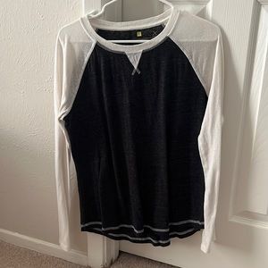 Lightly worn dark grey with white long sleeves.